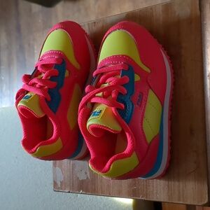 New pair of bright colored fils girl sneakers